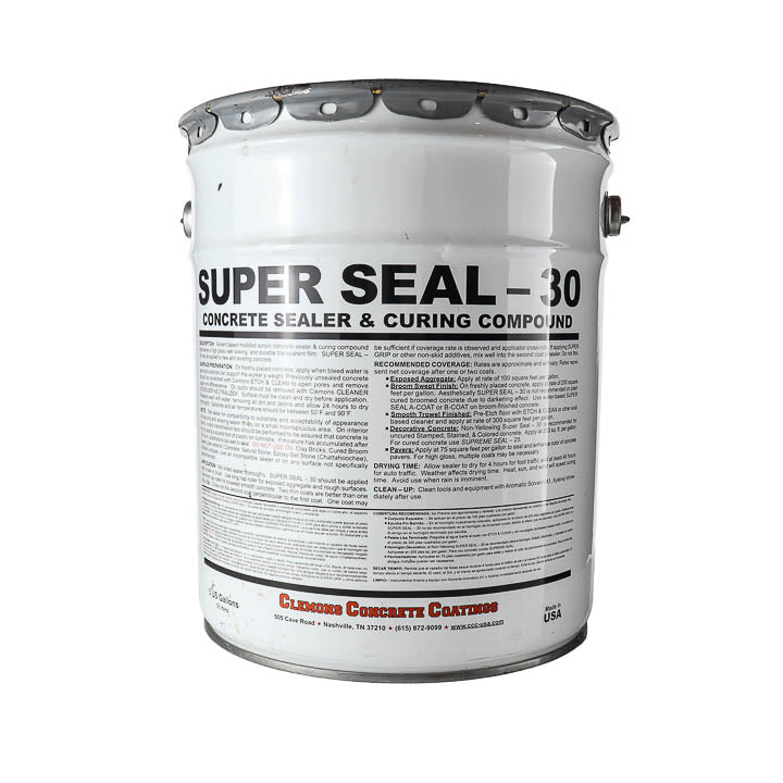 A white metal bucket of Glazing Concrete Coatings Super Seal - 30 Concrete Sealer & Curing Compound, featuring a detailed black and red label, on a solid white background.