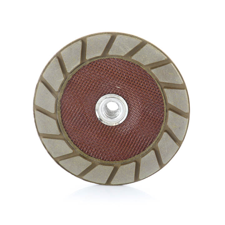 A circular abrasive grinding wheel with a textured brown center and a segmented gray outer rim, shown on a white background.