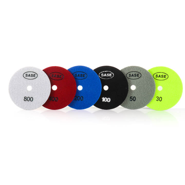 Six of the SASE Resin Bond Diamond Pads, the white 800, Red 400, Blue 200m Black 100, Grey 50 and the yellow 30 Grit pads