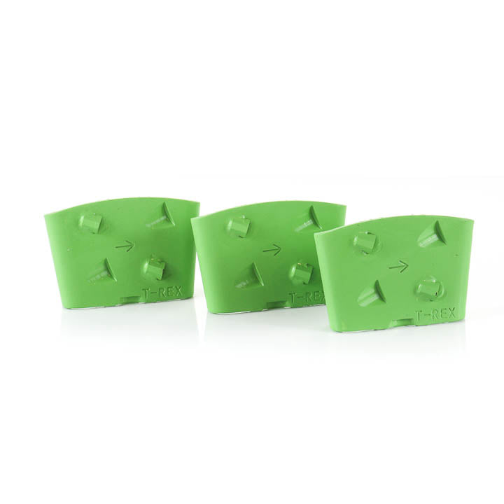 Set of three green Husqvarna EZchange mounting blocks arranged side-by-side on a white background.