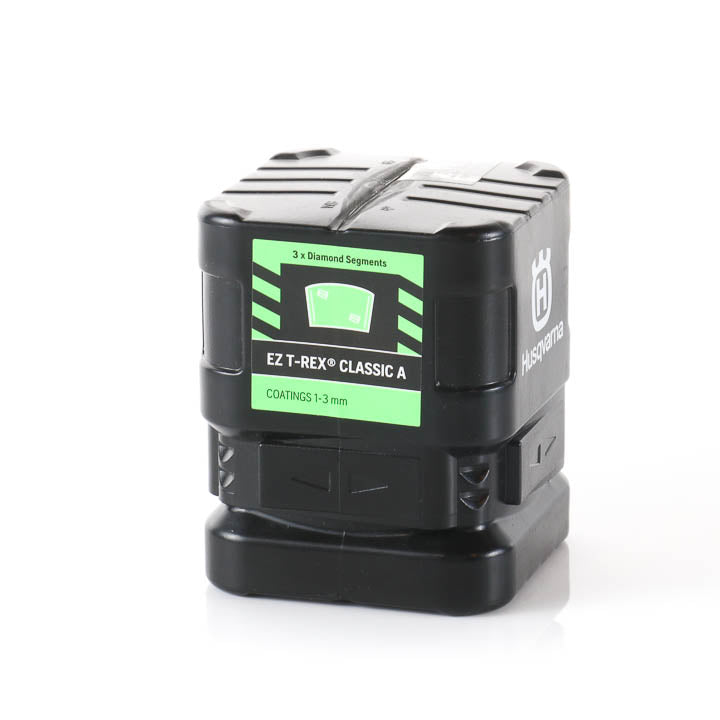 Set of three green Husqvarna EZchange mounting blocks a white background in retail packaging