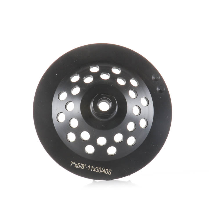 Back view of the 7-inch 12-segment soft bond concrete grinding wheel showing mounting holes and printed specifications