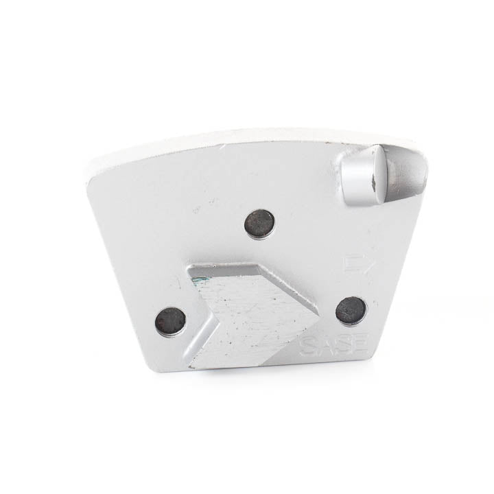 Close-up view of a single SASE Wulf Single Arrow 13mm PCD trapezoid grinding plate.