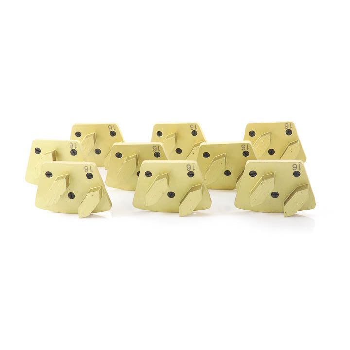 Set of nine yellow SASE trapezoid double arrow diamond grinding tools arranged together on a flat surface.