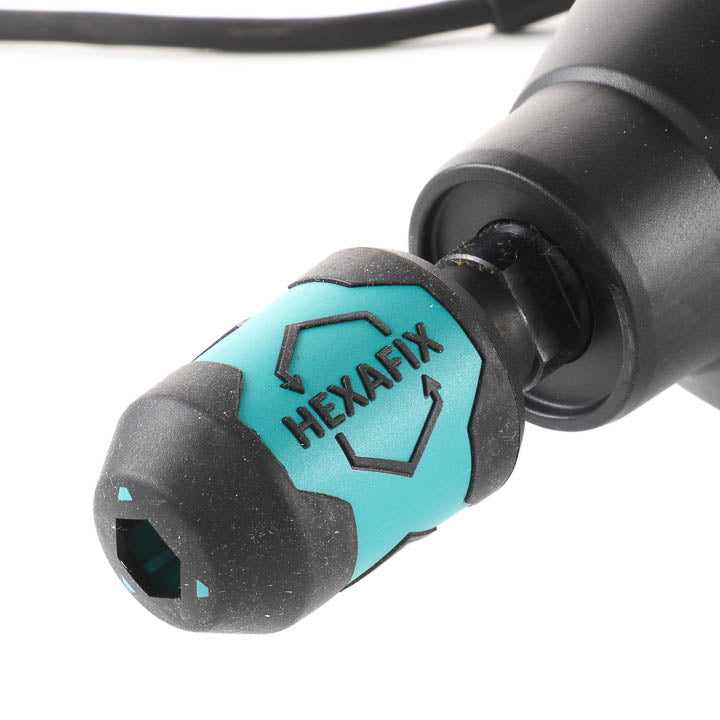 Close-up view of the quick-coupling mixing shaft connection on the Collomixer XQ1.