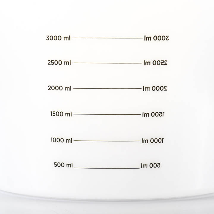 Close-up view of the exterior measurement scale on the calibrated mixing pail, showing volume graduations.