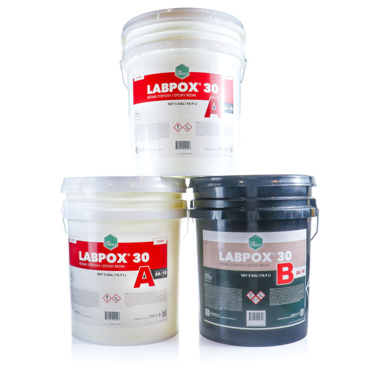 Three LABPOX 30 resin buckets stacked in a studio setup: one white bucket labeled "A" on top, with a white bucket labeled "A" and a dark bucket labeled "B" below.