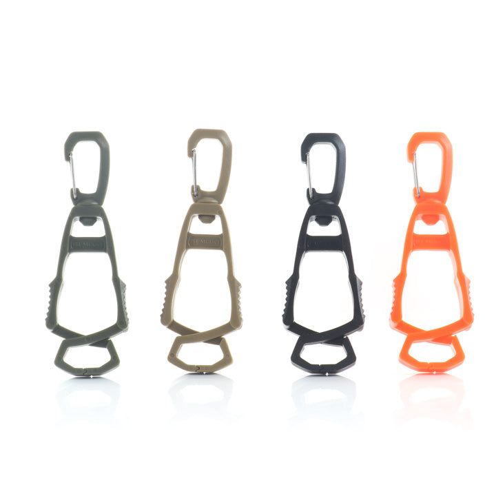Four glove clips displayed in a line against a white background, shown in different color options from left to right: olive drab, flat dark earth, black, and hi-vis orange.