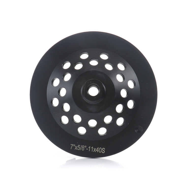 A black 7-inch diamond grinding cup wheel featuring large arrow-shaped segments and multiple ventilation holes, shown against a clean white background.
