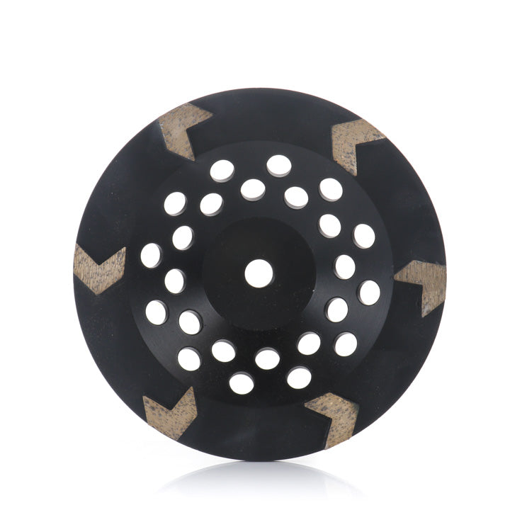 A black 7-inch diamond grinding cup wheel featuring large arrow-shaped segments and multiple ventilation holes, shown against a clean white background.